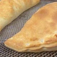 Calzone · Ricotta cheese, mozzarella cheese, sausage and house salad 
for an additional charge.