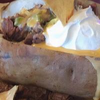 Potato Nachos · Beef, chicken or mixed fajitas over deep fried potato slices, covered with gravy, Monterey j...