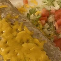 Burrito California · A foot long hand rolled flour tortilla. Stuffed with beans, rice, ground beef, lettuce, pico...