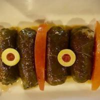 Dolmeh · Grape Leaves stuffed with fresh herbs and rice