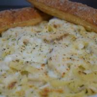 Chicken Alfredo · Fettuccine noodles baked with our creamy, cheesy alfredo sauce & topped with sliced chicken ...