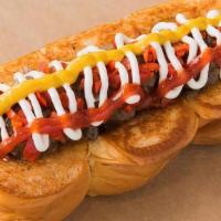 Downtown · Smoked bacon wrapped dog, caramelized onions, pickled peppers, mayo, mustard, ketchup.