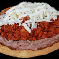 Sopes / Sopes  · Preparado con frijoles y queso fresco. / Prepared with beans and fresh cheese.