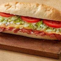 Italian Sub · Ham, pepperoni provolone cheese, onions, shredded lettuce and tomato served with Italian dre...