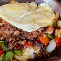 Hash Skillet · CORNED BEEF HASH ,ONIONS,RED AND GREEN PEPPERS,CHERRY TOMATOES,AND CHEDDAR CHEESE 
2EGGS