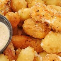 Cheese Curds. · Breaded white cheddar curds, choose two sauces