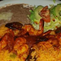 Sencillo Plate · Three enchiladas a cheese, chicken and beef with rice and beans.