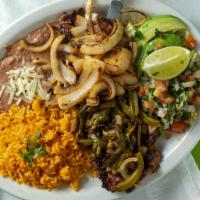 Carne Asada Con Nopales · Grill steak with cactos, rice beans and salad.