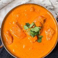 Chicken Tikka Masala · Barbequed boneless chicken morsels cooked in an aromatic tomato and herb cream sauce.