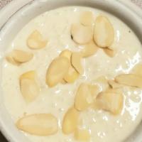Kheer Badami · Traditional Indian rice pudding, made with raisins and nuts.