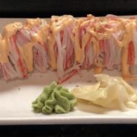 Pink Dragon Roll · Two shrimp tempura, cucumber, topped crabmeat with spicy mayo.