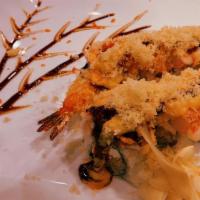 Kensington Roll · Two shrimp tempura, cream cheese, topped kani, shrimp, special sauce, crunchy.