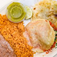 Gordita Plate · Served with three gorditas, beans, rice, salad, and one salsa green or red.