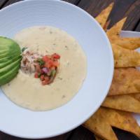 Crab Queso · Served with jalapeno cheddar tortilla chips