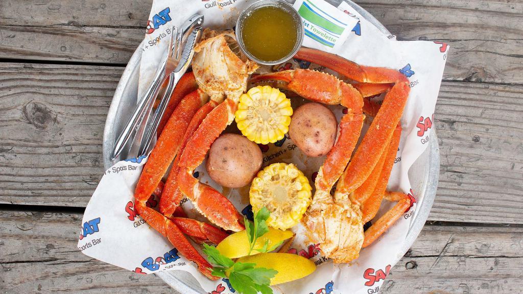 Boiled Snow Crab With Potatoes + Corn · 1 pound Jumbo Snow Crab served with drawn butter 2 corn on the cob and 2 red potatoes