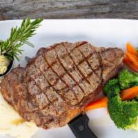 14 Oz Ribeye Steak · Texas 44 Farms hand cut 14 oz ribeye with choice of 2 sides