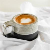 Cappuccino · 2 shots of Espresso mixed with 4 ounces of drizzled  steamed warm milk of your choice. (Syru...