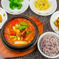 Kimchi Ji Gae · Spicy stew made with ripened Kimchi,pork,tofu, and assorted veggies
