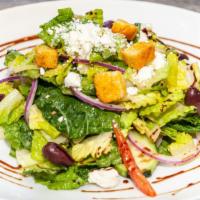 Greek Salad  · Romaine lettuce, red onion, kalamata olives, tomatoes, feta cheese, and croutons tossed in G...