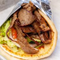 Gyro · Roasted beef, lamb slices, lettuce, tomatoes, cucumber, onions, and tzatziki sauce wrapped i...