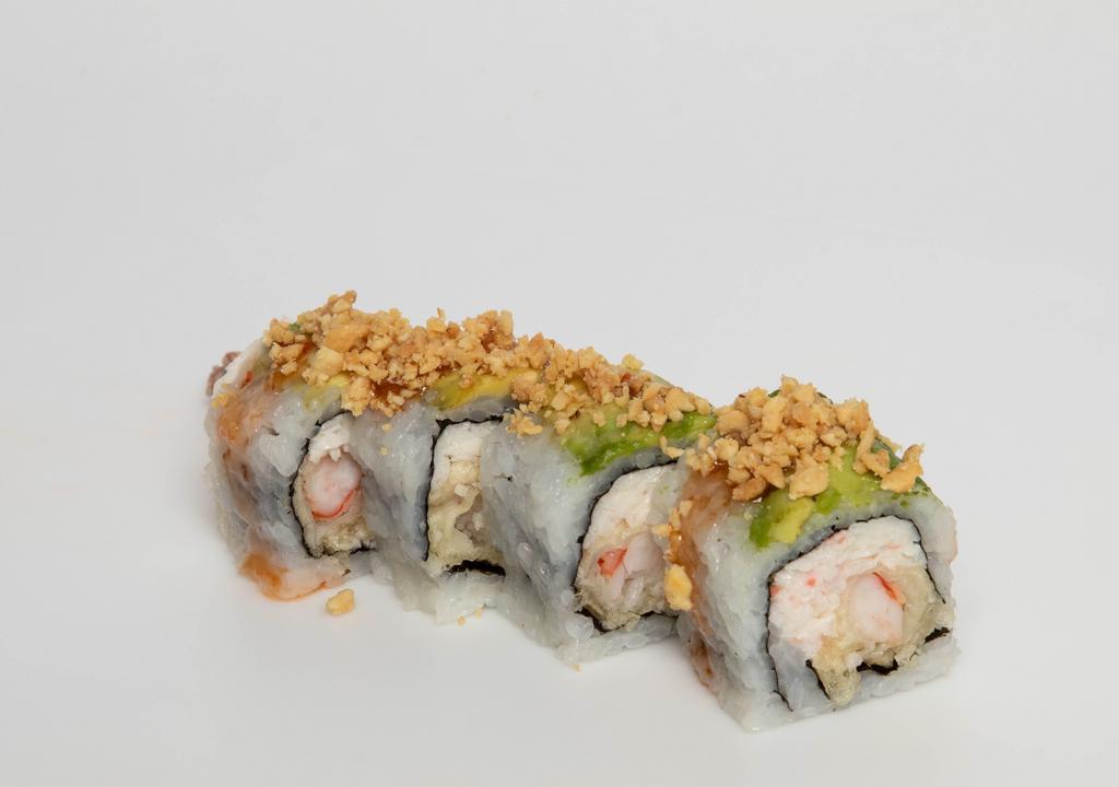 Scorpion Roll · Shrimp tempura, cream cheese, jalapenos inside, topped with crab stick, avocado and spicy wasabi tobiko.