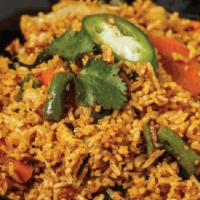 Vegetables Biryani (Gf) · Basmati Rice stir fried with vegetables, garlic, ginger, onion, and whole spices. Served wit...