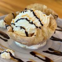 Fried Ice Cream Buñuelo · Mexican Vanilla Ice Cream, Cinnamon, Whipped Cream, Chocolate Sauce, Served in a pastry shel...