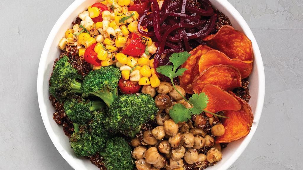 Power Bowl · Harissa grain blend, hummus, roasted sweet potatoes, sweet corn & tomato, roasted broccoli, cucumber salad, pickled red onions, yogurt harissa. TEMPORARILY NOT VEGAN