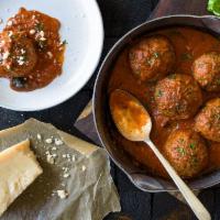 Grass-Fed Meatballs · Three all-beef meatballs rolled with Italian breadcrumbs and topped with pomodoro sauce and ...