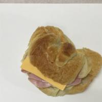* Ham & Cheese Croissant · No Egg
Ham & Cheese croissant sandwich.