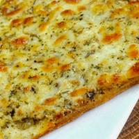 Pesto Bread · Thin crust or Cauliflower crust with basil pesto and mozzarella melted over. Yum!!