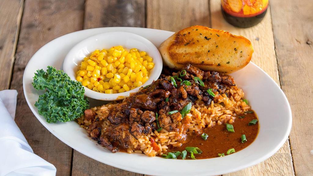 Grilled Alligator · Over jambalaya rice with BBQ “ouch” sauce.