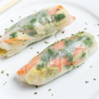 Fresh Spring Roll · Fresh lettuce, cilantro, carrots, pineapple and cucumber wrapped in rice paper and served wi...