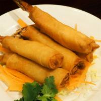 Crispy Shrimp Rolls · Jumbo shrimp in egg roll wraps fried crispy and served with plum sauce