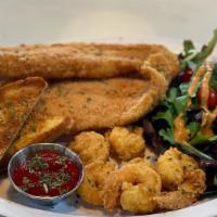 Ari Ari Fish Basket · Two fried fish filets, six fried shrimp, two pieces of Texas toast and a side salad.
