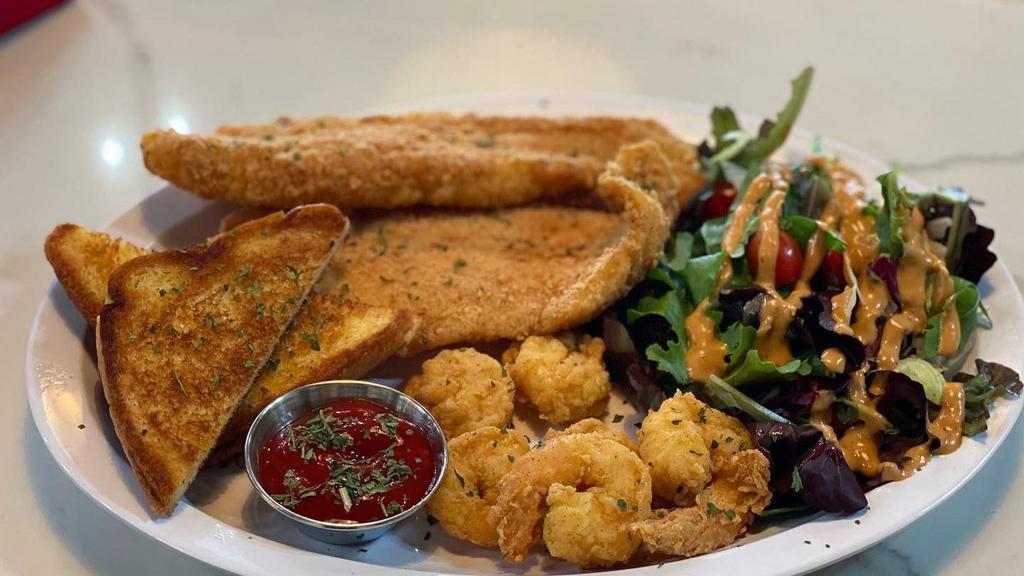 Ari Ari Fish Basket · Two fried fish filets, six fried shrimp, two pieces of Texas toast and a side salad.