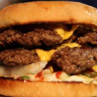Double Cheeseburger · Two patties, double cheese, tomatoes, lettuce, pickles, ketchup mustard and mayo.