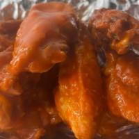 6 Fried Wings · Favorite. Gluten free. Six chicken wings fried to order.
