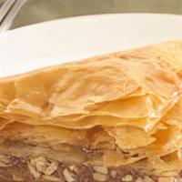 Baklava · Light and crispy pastry with a delicious center of walnuts.