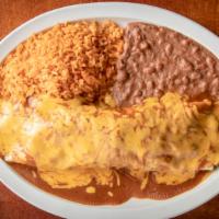 Burrito Fajita · Chicken or beef fajita. Topped with chile gravy and melted cheese. Served with rice, beans.