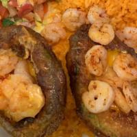 Stuffed Avocados · Beef or chicken fajitas or shrimp and ccq on top served with rice, charro beans, pico, and t...