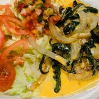 Pechuga Geo'S Style · Grilled poblano pepper and onions with cheese dip on top, served with rice, beans, pico de g...