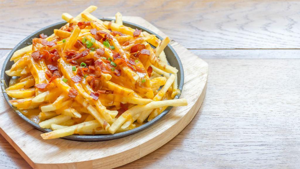 Bacon Cheese Fries · Delicious French fries deep fried 'till golden brown, and topped with crispy bacon and melted cheese.