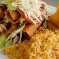 Chicken Flautas Plate · Served with rice, beans, salsa, onions and cilantro, tortillas.