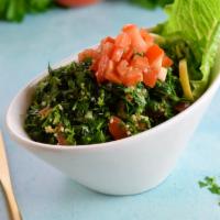 Tabouli Salad · Fresh Italian Parsley, Tomatoes, Onions, Wheat, Finely Chopped & Tossed With Olive Oil & Fre...