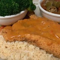 Fried Catfish Etouffee · Friday's Special 
Farm-raised Fried Catfish Filets, served over a bed of rice, & then topped...