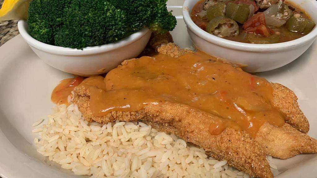 Fried Catfish Etouffee · Friday's Special 
Farm-raised Fried Catfish Filets, served over a bed of rice, & then topped with Etouffee Sauce
Served with 2 large sides (Friday's only)