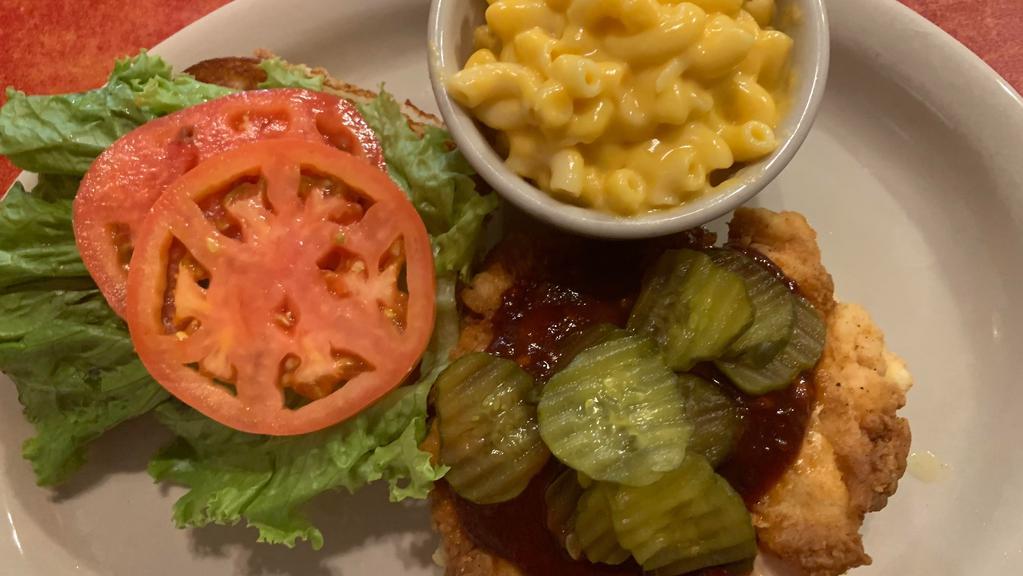 Hot Chicken Sandwich  · Hoover's Hot Chicken served on a Kolache bun, with spicy mayo, and Hoover's famous Austex wing sauce, with lettuce, tomato, &  pickles.