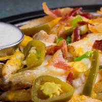 Loaded Cheese Fries · One pound of French fries flavored with homemade seasoning, topped with cheddar, Monterey ja...