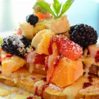 French Toast With Fruit (Full Order) · Our French toast, topped with seasonal fresh fruit, crème anglaise, raspberry sauce, walnuts...